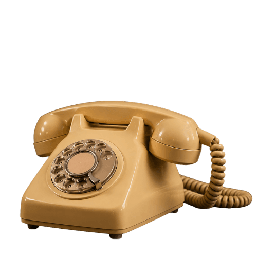 A cream Bakelite rotary telephone